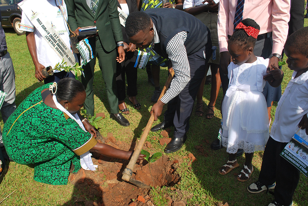 Betty Mutunda and Tefero Lule launching the tree planting project at St Peters Church of Uganda, Kakiri. (Photo by Jovita Mirembe)