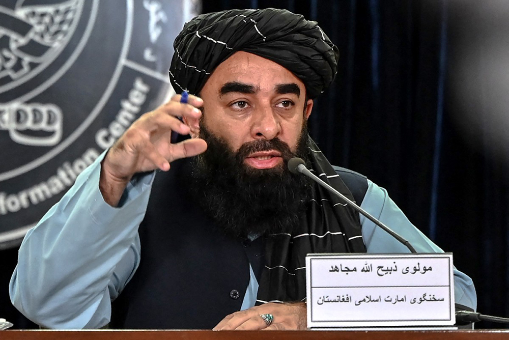 Taliban government spokesman Zabihullah Mujahid speaks during a press conference in Kabul on October 12, 2025. 