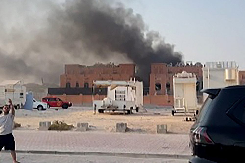 This frame grab taken from an AFPTV footage shows smoke billowing after explosions in Qatar's capital Doha on September 9, 2025. Israel's military said it carried out air strikes on September 9 targeting senior Hamas leaders in the Qatari capital Doha, the venue of multiple rounds of talks aimed at ending the Gaza war. 
