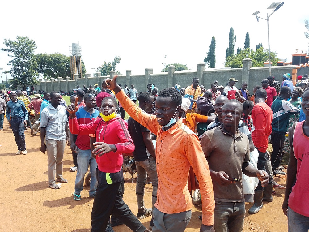 Some of the supporters of General Jeje Odongo outside his home waiting for him. (Photo by Godfrey Ojore)