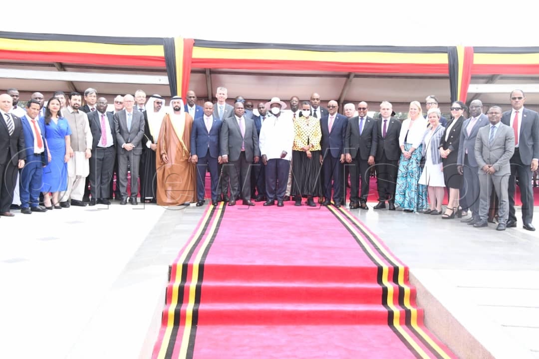 Diplomats in a group photo with H.E. President Museveni and the First Lady and Minister of Education and Sports.