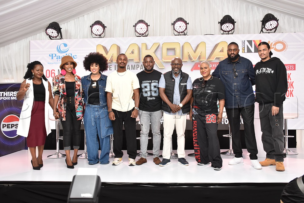 Makoma posing a photo moment with Vision Group CEO Don Wanyama and sponsors.