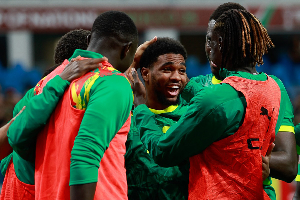 Senegal's forward #27 Ibrahim Mbaye (C) celebrates with teammates after the Africa Cup of Nations (CAN) round of 16 football match between Senegal and Sudan at Grand Stadium in Tangiers on January 3, 2026. (Photo by Abdel Majid BZIOUAT / AFP)
