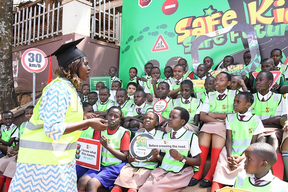 Mable Tomusange, Managing Consultant, Consult Afrika Usalama, an advocate of road safety teaching children about road safety. (Credit: Mpalanyi Ssentongo)