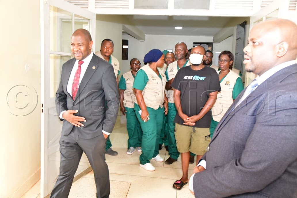 Health authorities with the last Ebola patient who fully recovered.