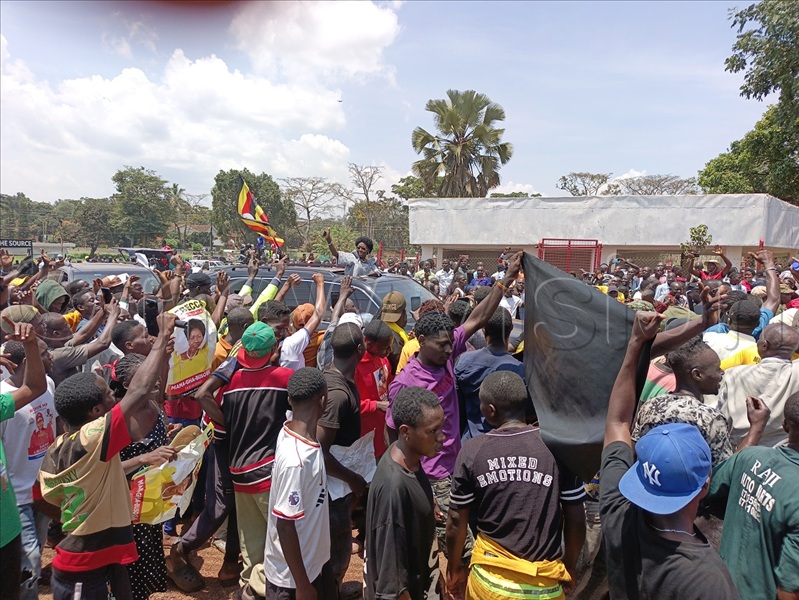 Security personnel struggled with supporters who attempted to force their way to the central business area, which remained restricted to her convoy to ensure business sanity. (All Photos by Jackie Nambogga)