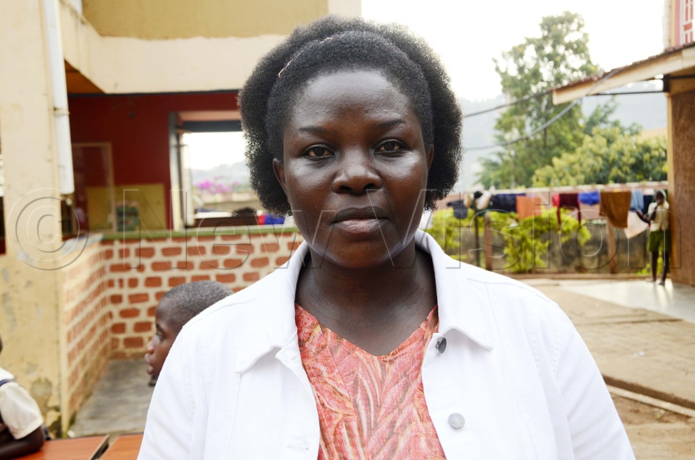 Loyce Taaka Odwori, Mukono Municipal special needs education primary school team lead during an interview about the procured desks for special needs children. (Photo by Juliet Kasirye)