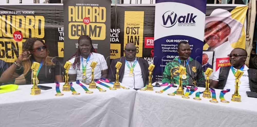 Solomon Aboda, the Foundation's Chairperson (C) with other artistes, hold a press conference at Kaunda Grounds in Gulu City. (Credit: Jesse Johnson James) 