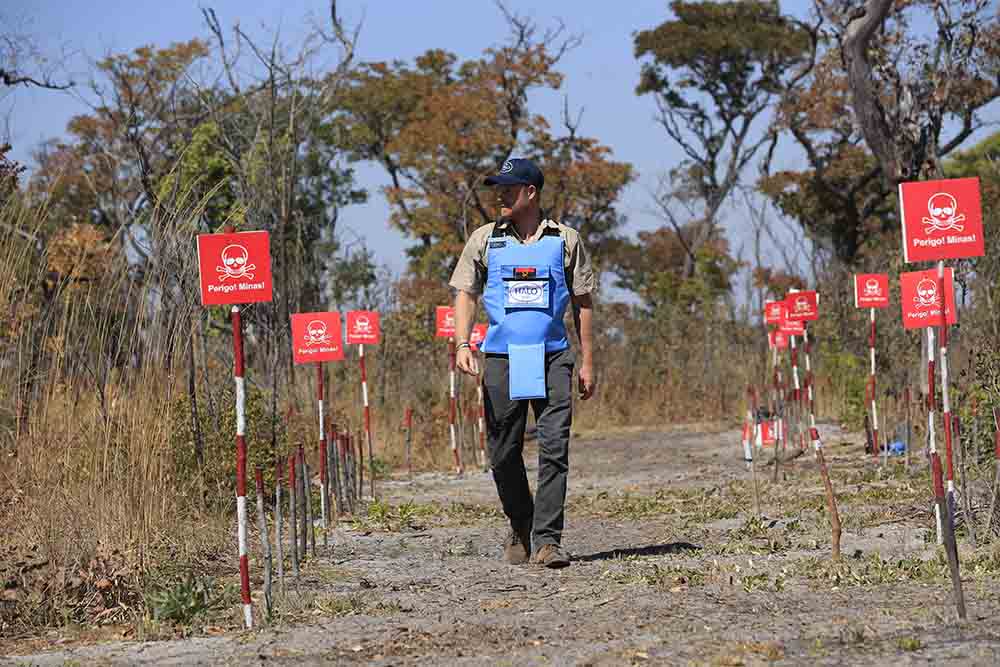 In a handout picture released by the Halo Trust charity, Britain's Prince Harry, Duke of Sussex takes part in a mine awareness safety class in Cuito Cuanavale, Cuando province, southern Angola, on July 16, 2025. (Credit: AFP)