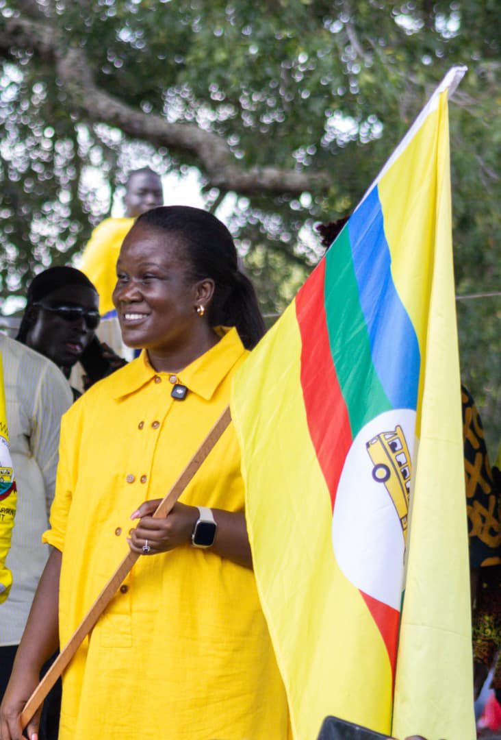 Jane Frances holding the NRM flag after her nomination.