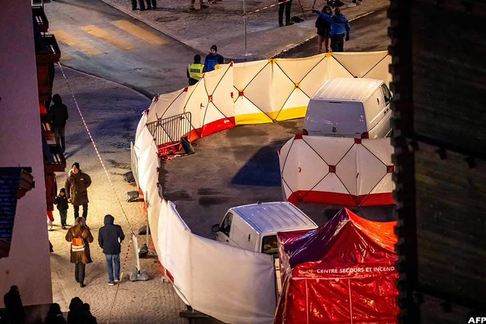 Fences are displayed near the Constellation bar where the deadly fire occurred in the Alpine ski resort town of Crans-Montana.