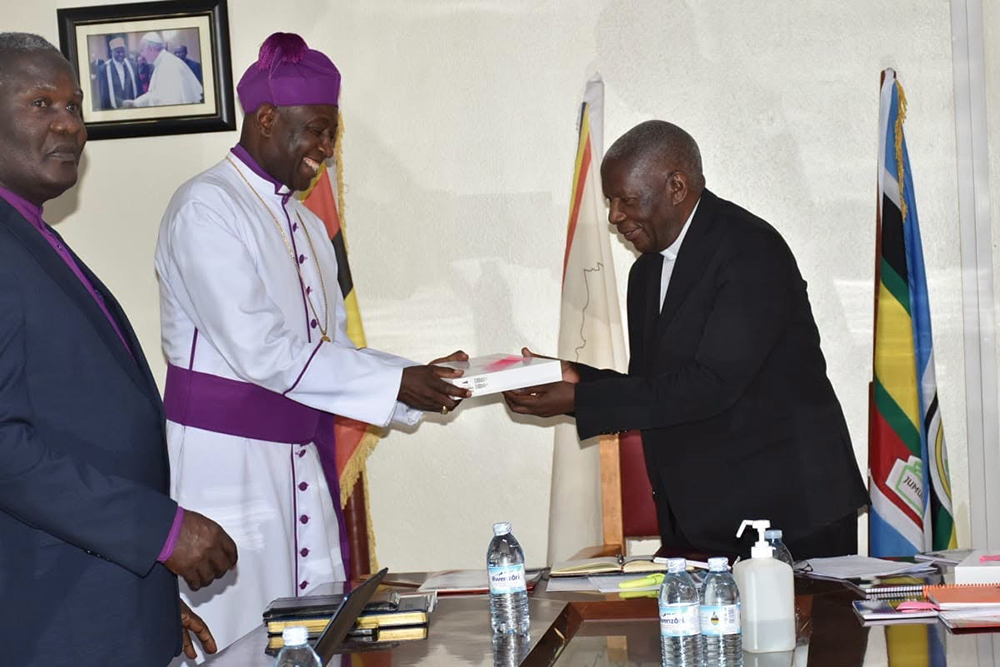 Archbishop of the Church of Uganda, Dr. Stephen Samuel Kaziimba handing over office to Dr. Joseph Antony Zziwa.