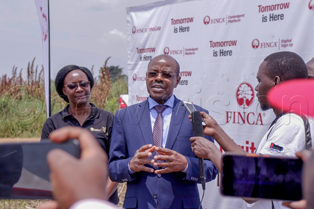 State minister for finance, Amos Lugolobi speaking to journalists after launching the campaign. (Photo by Ivan Kabuye)