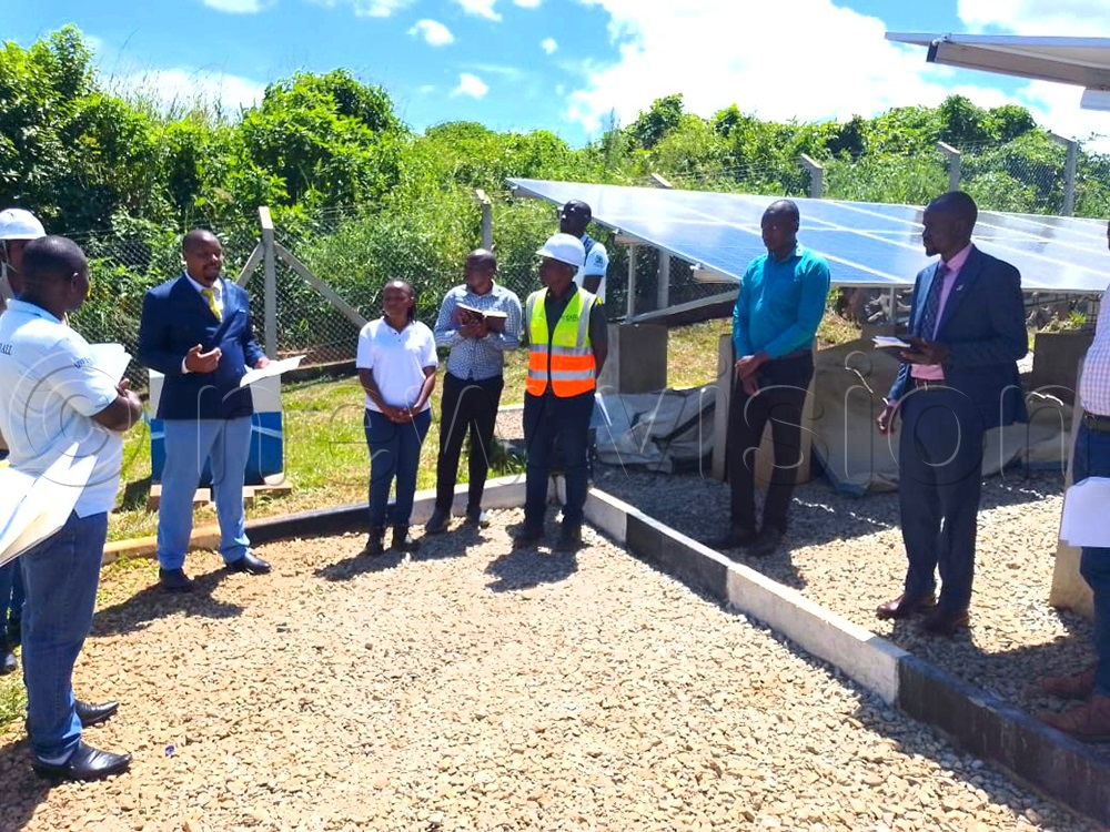 Hoima district leaders inspecting the water project. (Photo by Peter Abaanabasazi)