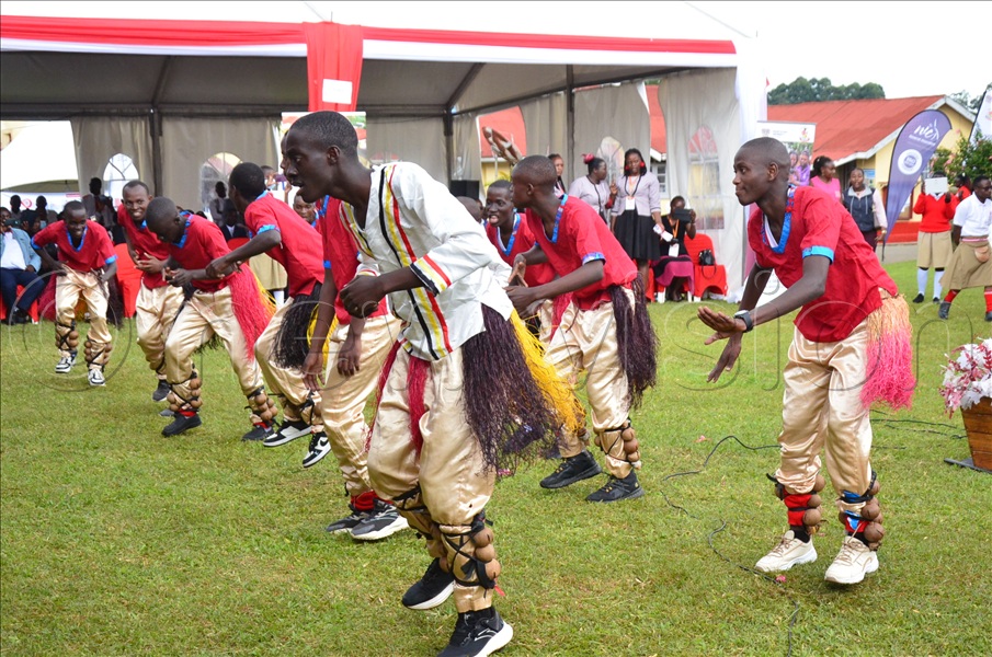 Students perform during the centenary celebrations. (All Photos by Jonan Tusingwire)
