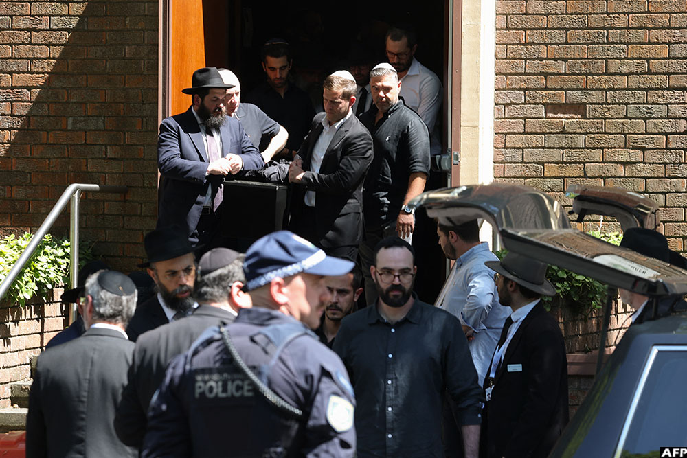A coffin is carried out after the funeral of Boris and Sofia Gurman, who were killed in the December 14 Bondi Beach shooting attack.)