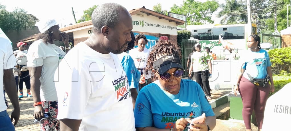 Former FDC presidential candidate and Secretary General Nathan Nandala Mafabi (left) joined the run. 
