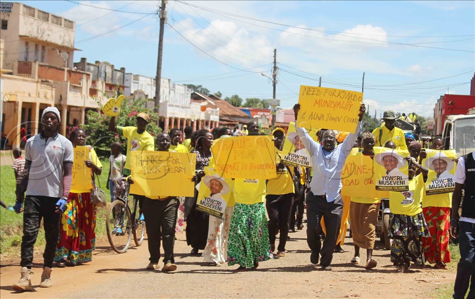 NRM supporters matching through the town of Kaberamaido as Museveni sworn in for his seventh term. (Credit: Michael Onyinge)
