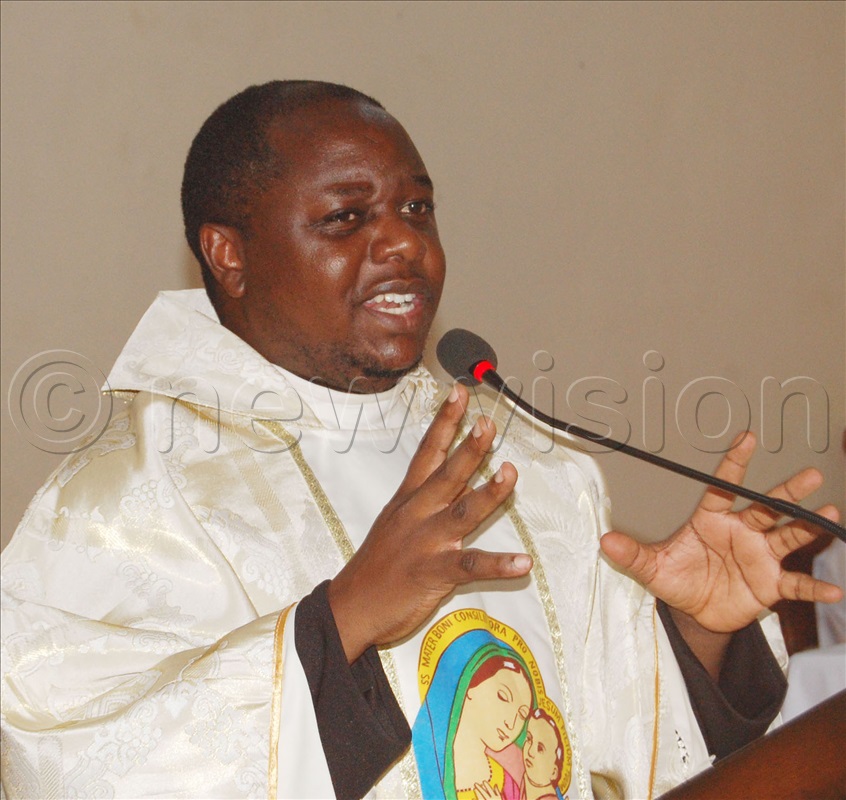The school chaplain, Fr Larry Lugoloobi delivers his homily during the thanksgiving mass.