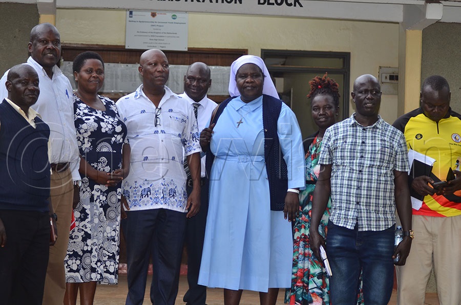 Sister Hellen Lamono, the headteacher of Sacred Girls SS with the inspection team
