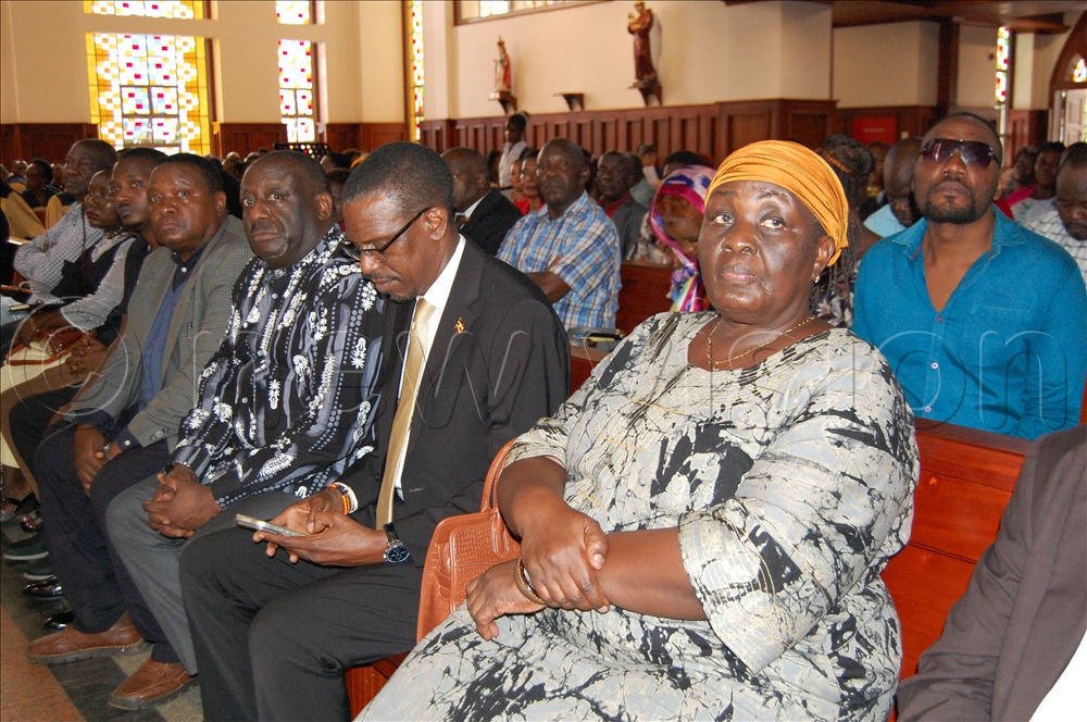 Former Vice-President Specioza Wandira Kazibwe (right) and other high-profile mourners during the requiem mass.