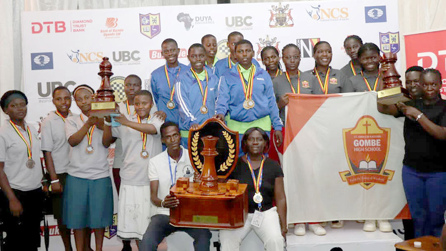 The top three secondary school girls' teams Mustard Seed SS (left) Wampeewo Ntakke-A (center) and St. Andrew Kaggwa Gombe pose with their trophies after the Fr. Grimes Chess Championship at Ntare School, May 7, 2026. Courtesy photo
