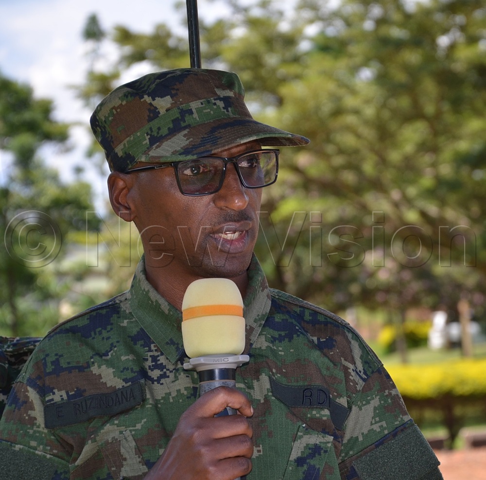 Col Emmanuel Ruzindana, Rwandan defence attache during a pass out at Magamaga barracks in Mayuge where he praised Uganda as a great place of their military trainees on Wednesday. (Photo by Jackie Nambogga)