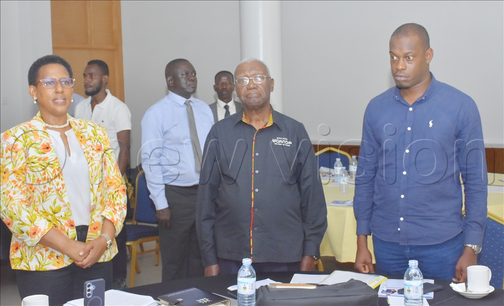 Tourism minister Tom Butime (centre), state minister Martin Mugarra (right) and the permanent secretary Doreen Katusiime during the top management retreat in Jinja city.