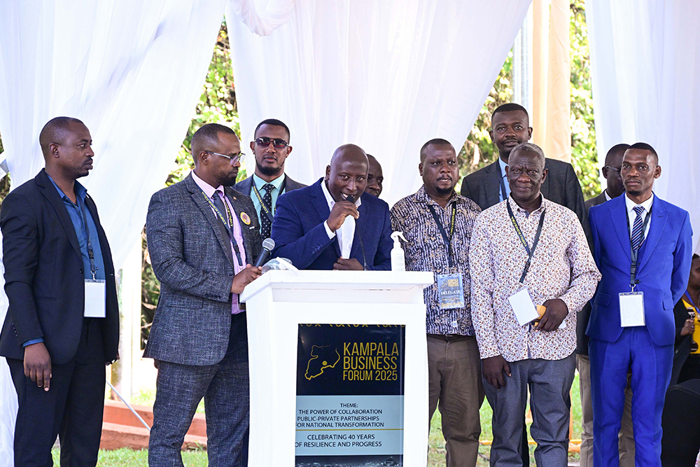 Members of Kampala City Traders Association (KACITA) express their support for President Museveni during the Kampala Business Forum at Serena Hotel in Kampala on Sunday. (PPU Photo)