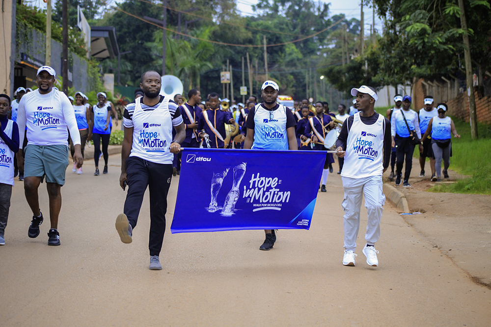 Participants in dfcu Bank’s Hope in Motion initiative walk to raise awareness about sickle cell disease.