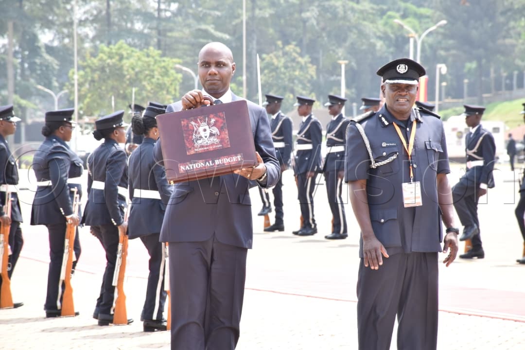 Minister of Finance, Planning and Economic Development, Henry Musasizi, arrives with the budget. (Credit: Simon Peter Tumwine)