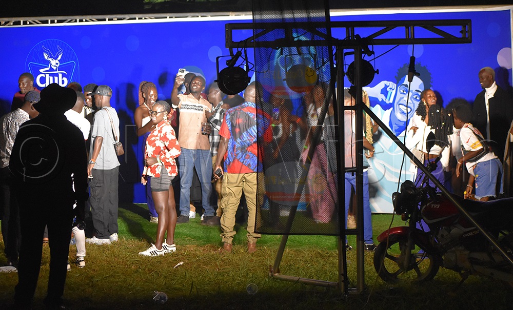 Some revelers making a good use of the photo booth to capture memories of Awilo's show. (Photo by Jesse Johnson James)