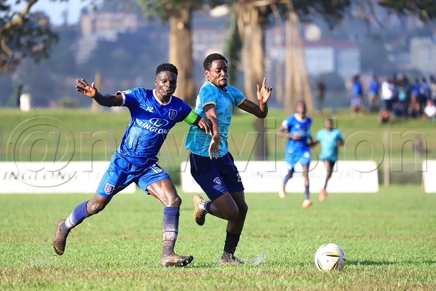 Owori (with armband) in action for SC Villa