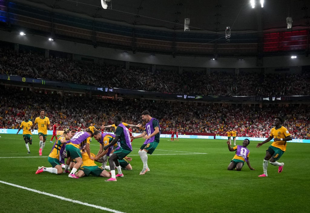 Players of Australia celebrate after scoring a goal during the 2026 FIFA World Cup First Stage Group D match between Australia and Turkiye at BC Place Stadium in Vancouver, Canada on June 13, 2026.