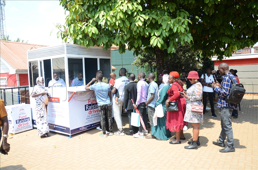 NUP supporters lining up to pay their contributions at Makerere Kavule in Kampala. (File photo)