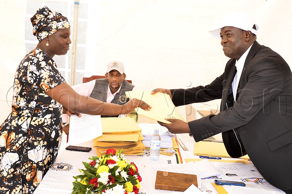 Sandra Acayo picking nomination forms for the 2026 general election. (Photo by Ronnie Kijjambu)