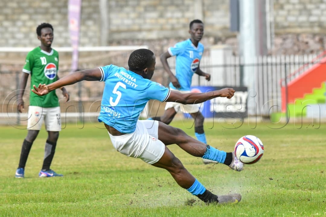 Bugema University's Joseph Male miscues a shot at goal during a tense match. (Photo by Richard Sanya)