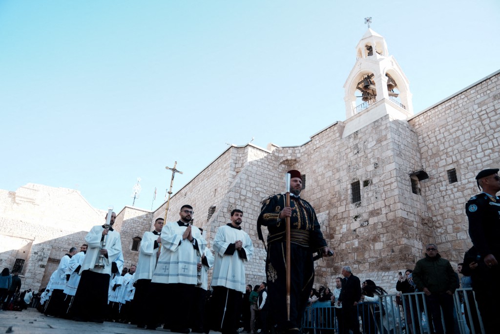 Latin Patriarch of Jerusalem Archbishop Pierbattista Pizzaballa attends the mass at the Church of the Nativity believed to mark the birthplace of Jesus, as part of Christmas celebrations in Bethlehem, West Bank on December 24, 2025. 