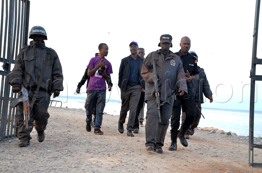 ANT's presidential candidate Maj.Gen (Rtd) with his security details returning from Kalangala district,  on Monday,  October,  13,2025. (Photo by Stuart Yiga)