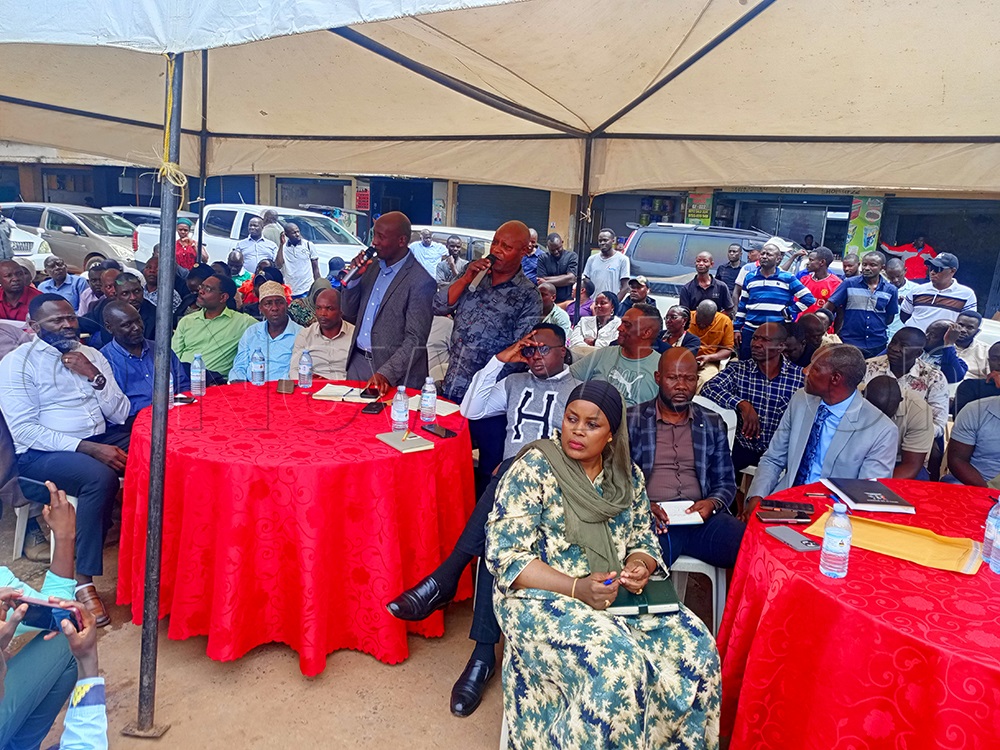 Kabanda talking about the traders' concerns during the meeting. (Credit: Moses Kigongo)