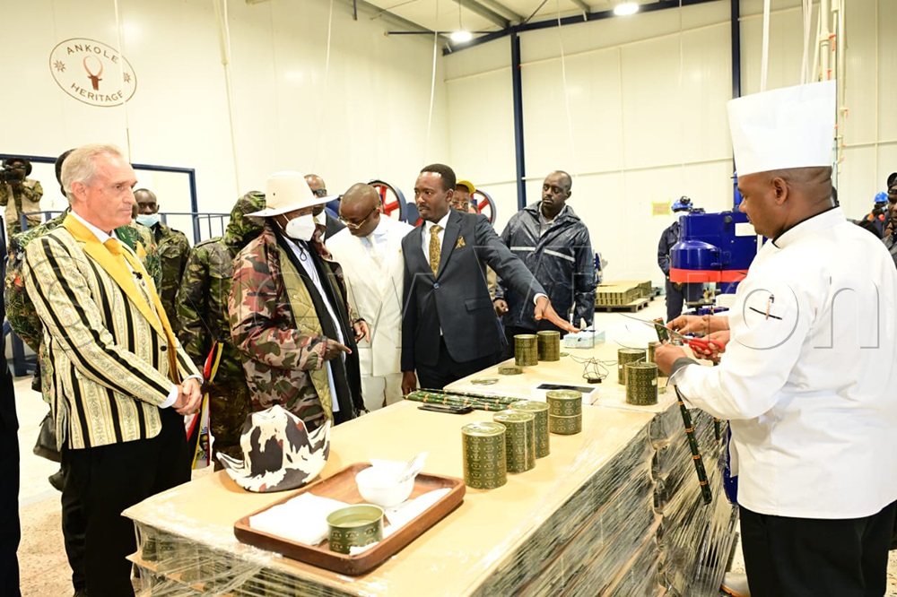 President Museveni tours the production of a range of products beyond meat and bean processing at the NEC Meat and Bean Processing Plant. (Credit: Eddie Ssejjoba)