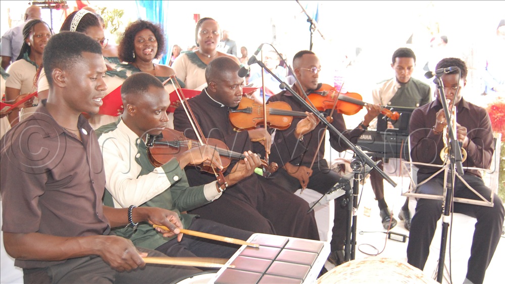 An action spectacle of the string/wind/percussive intruments section of the Celestial Chamber Chorale during Fr. Tamale's priestly silver jubilee thanksgiving mass.