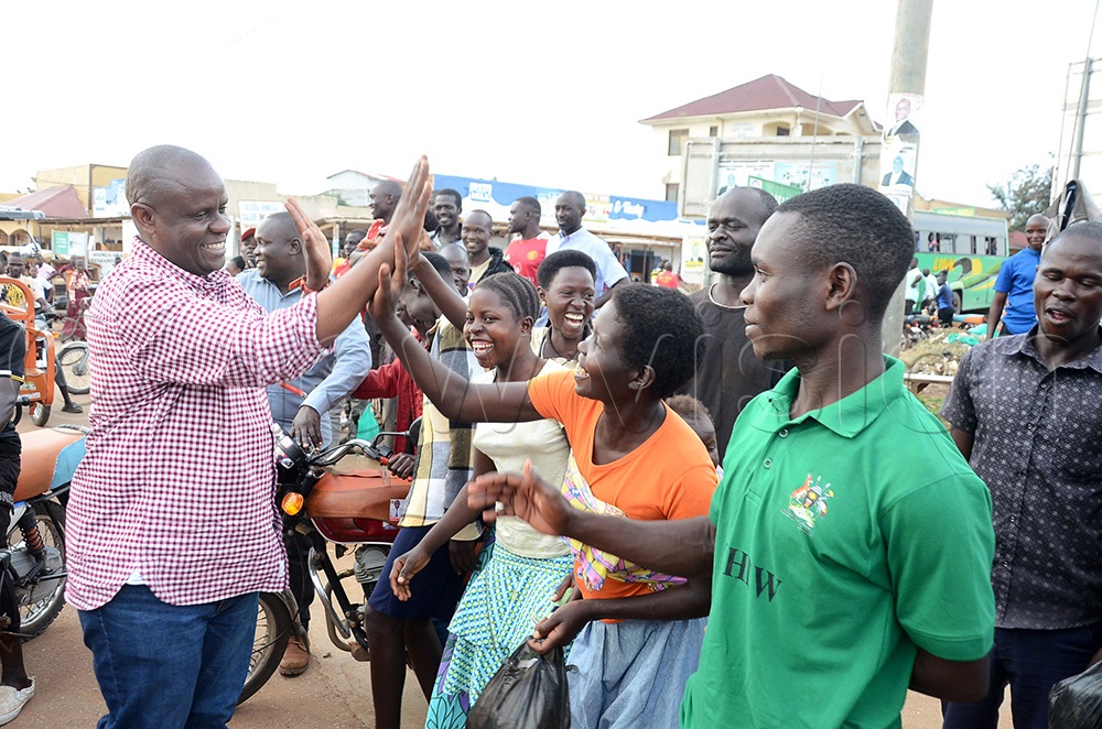 Balam Barugahara the Youth and Children Affairs Minister interacting with locals at Biiso town council in Buliisa district during his work visit to the district. This was on September 16, 2025. (Photo by Lawrence Mulondo) 