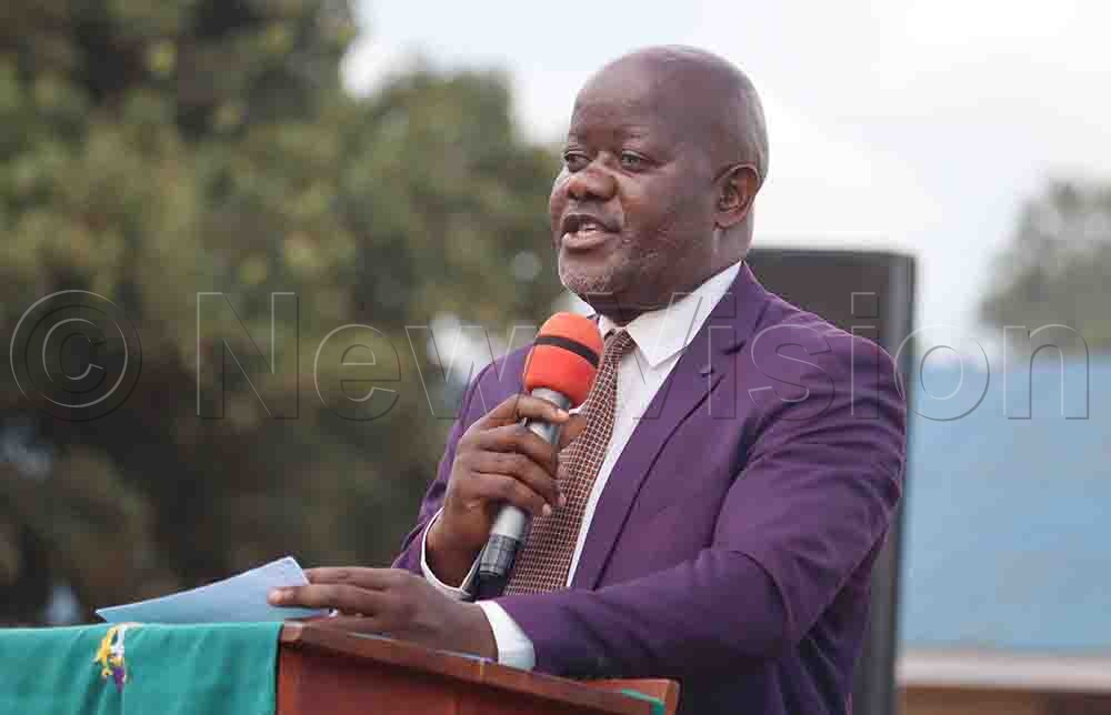 Fredrick Kabonge, the Kawuku Boarding Primary School headteacher, delivering his address during the function. (Credit: Henry Nsubuga)