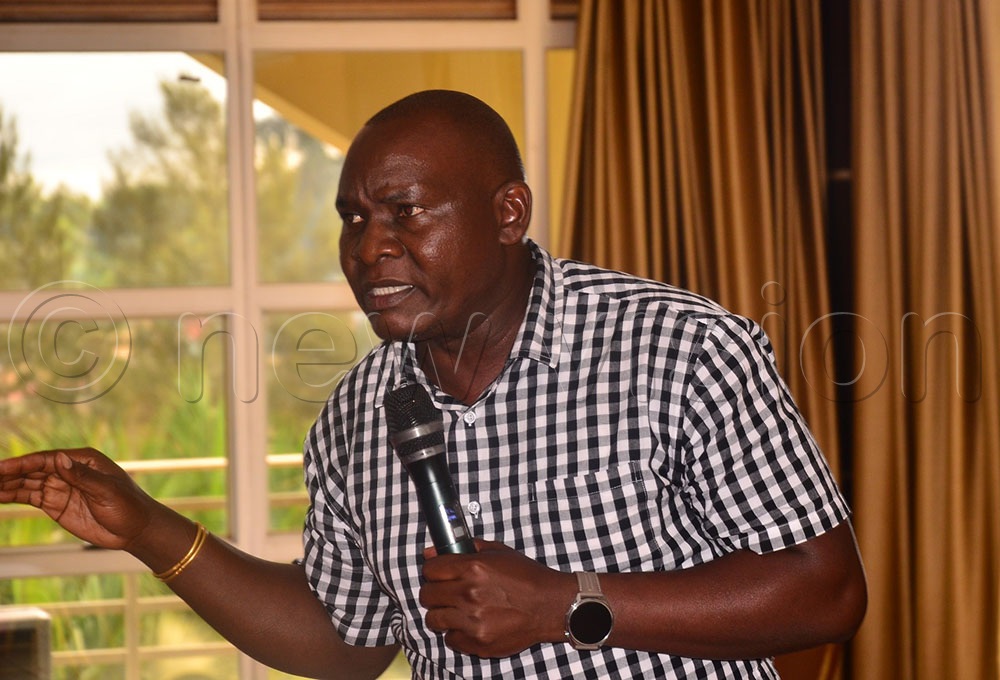 Martin Kasonzi, the Jinja deputy resident city commissioner in charge of southern division, lamented the ongoing voter location slip collection syndicate. (Credit: Jackie Nambogga)