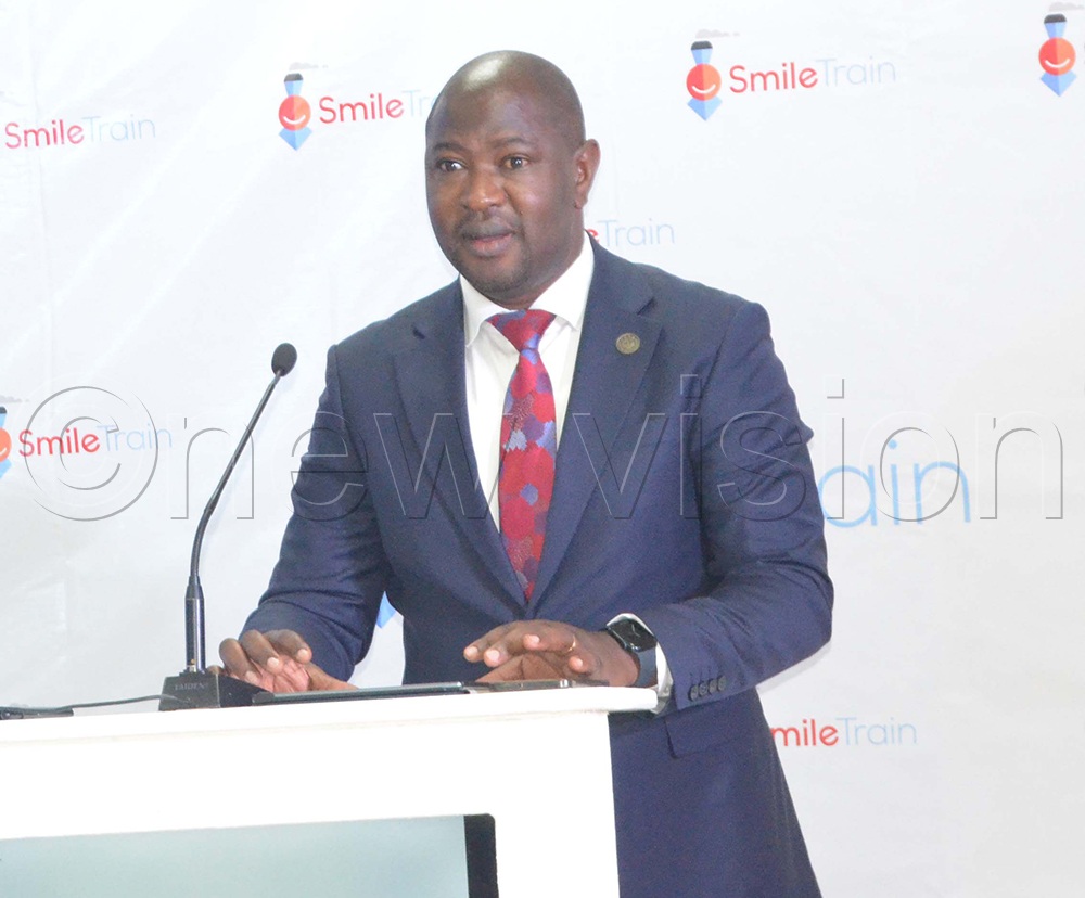 Dr Ronnie Bahatungire, Commissioner for Clinical Services at the Ministry of Health, speaks during the Smile Train Partners Engagement Forum at Hotel Africana. (Photo by Violet Nabatanzi)