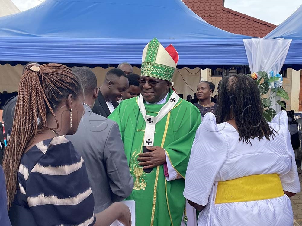 Archbishop called for continued peaceful coexistence between Ugandans and migrants, particularly Eritreans, many of whom have found a home in the surrounding community. (Credit: Ibrahim Ruhweza)