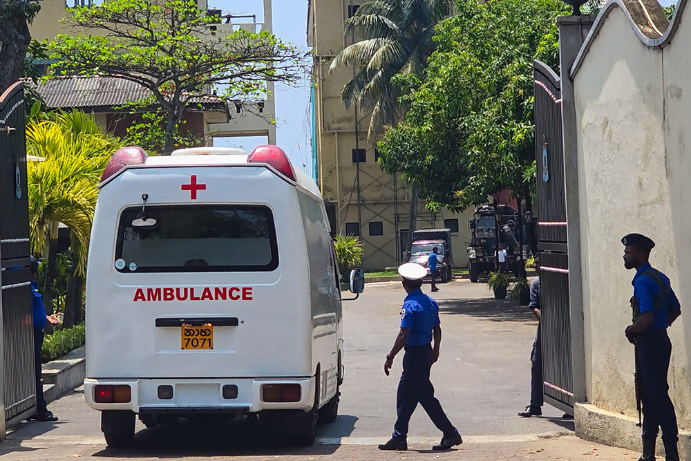 An ambulance enters Sri Lanka's southern naval head quarters in Galle on March 4, 2026, to pick up Iranian sailors rescued from Iranian frigate Iris Dena that was sunk off their island earlier in the day. (AFP)