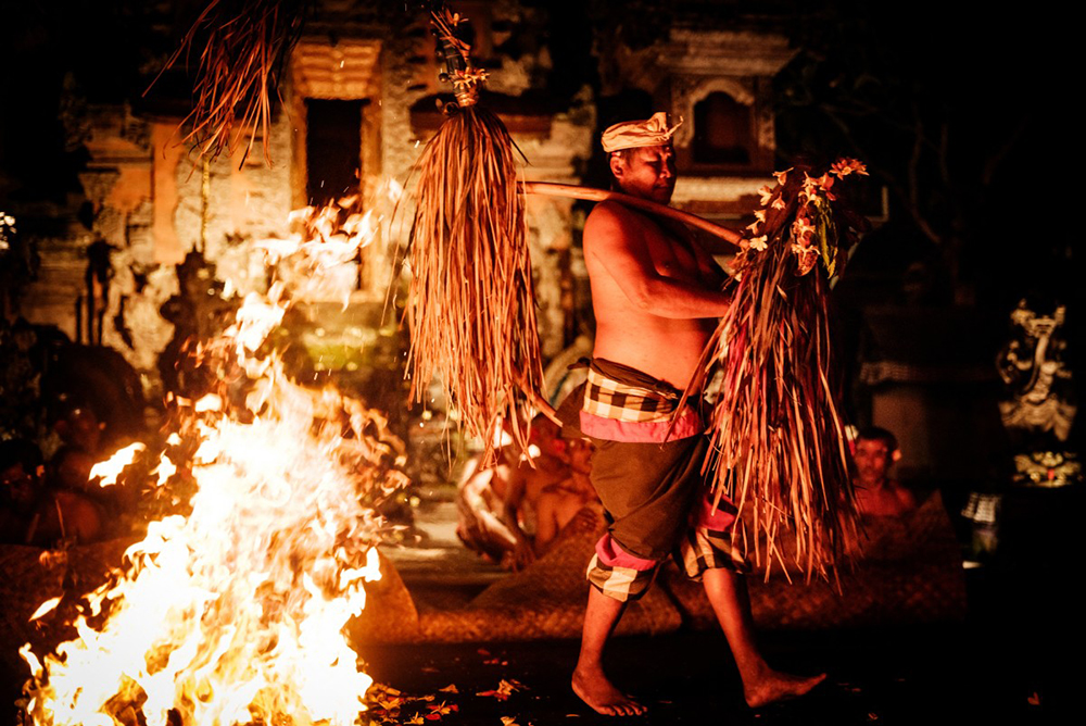 A Taman Kaja community member puts up a performance on New Year's Eve at the Pura Dalem Taman Kaja temple in Bali on December 31, 2025. (AFP)
