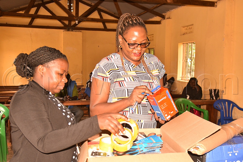 Esther Arinaitwe, Vision Group Newspaper in Education manager and Toto magazine editor, and Grace Nampiima, getting ready to train teachers in Napak in using newspapers in education. (Credit: Jacky Achan)